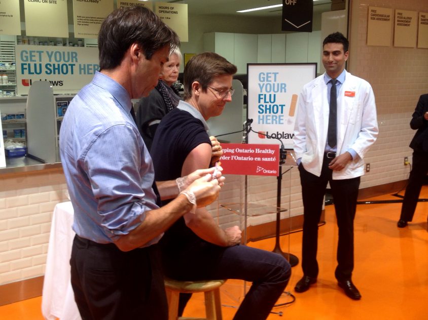 Health minister personally administers flu shot to launch 2014 vaccination program