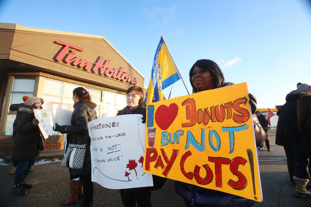 Poll: Ontarians split on support for paying more at Tim Hortons to restore workers' paid benefits and breaks