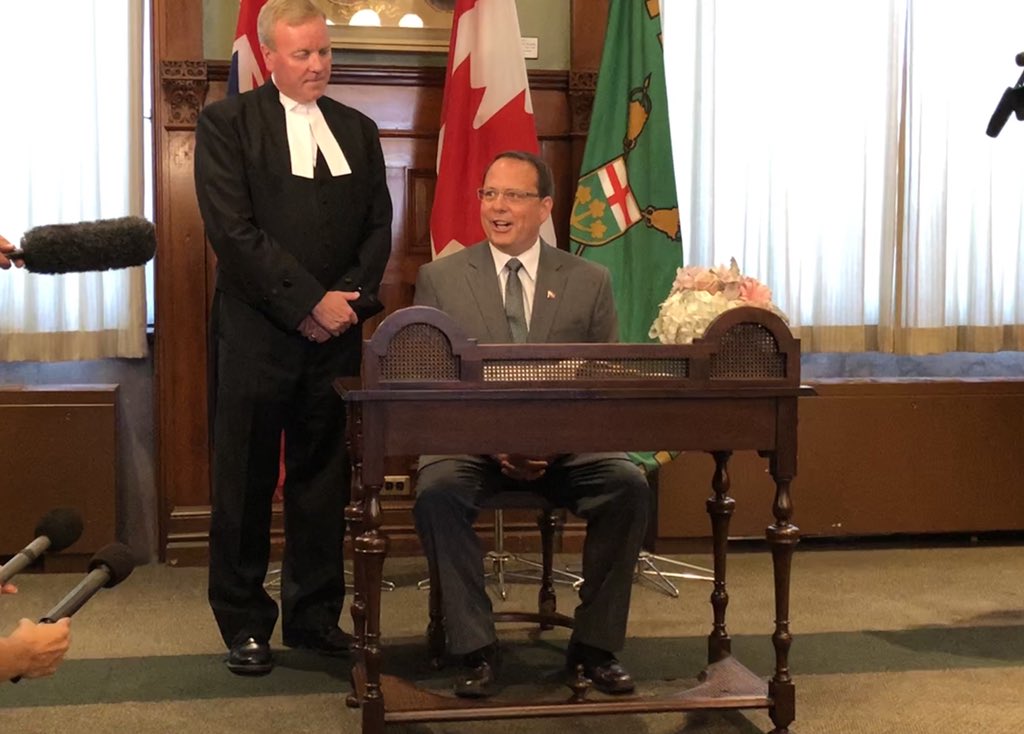A newly sworn-in Mike Schreiner calls Ford "reckless" on climate change
