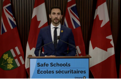 Education minister says asymptomatic testing target will improve safety in schools, but opposition says it's 'not adequate'